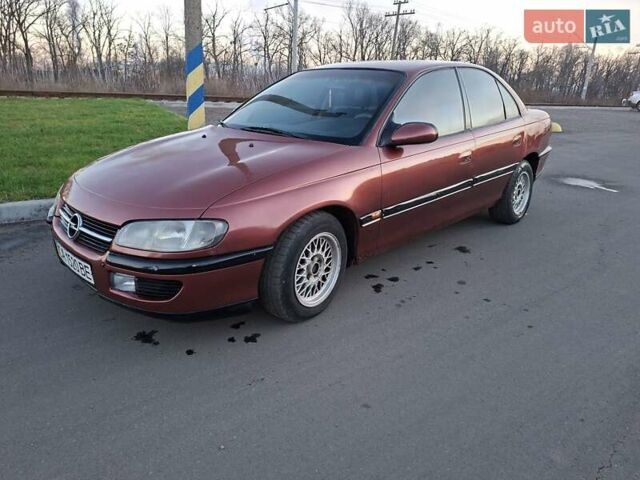 Красный Опель Омега, объемом двигателя 2 л и пробегом 400 тыс. км за 2390 $, фото 12 на Automoto.ua