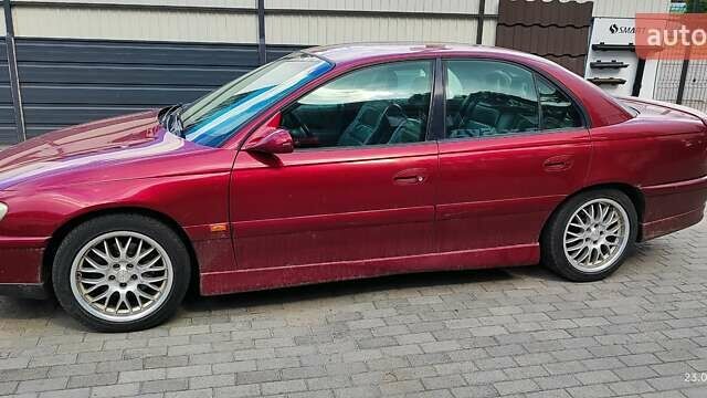 Червоний Опель Омега, об'ємом двигуна 2.5 л та пробігом 344 тис. км за 2800 $, фото 1 на Automoto.ua