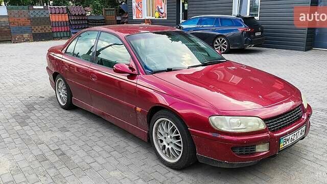 Червоний Опель Омега, об'ємом двигуна 2.5 л та пробігом 344 тис. км за 2800 $, фото 2 на Automoto.ua