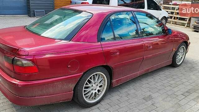 Червоний Опель Омега, об'ємом двигуна 2.5 л та пробігом 344 тис. км за 2800 $, фото 5 на Automoto.ua