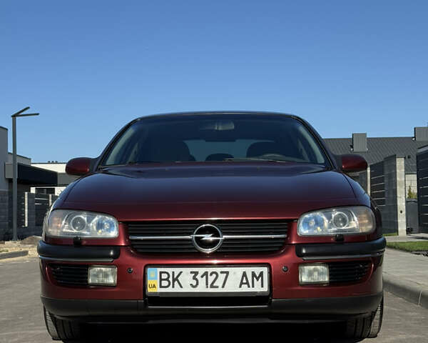 Красный Опель Омега, объемом двигателя 2 л и пробегом 298 тыс. км за 3500 $, фото 3 на Automoto.ua