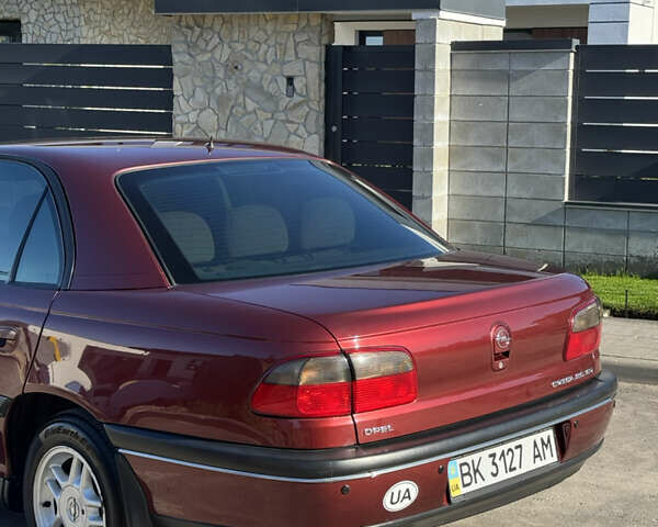Красный Опель Омега, объемом двигателя 2 л и пробегом 298 тыс. км за 3500 $, фото 10 на Automoto.ua
