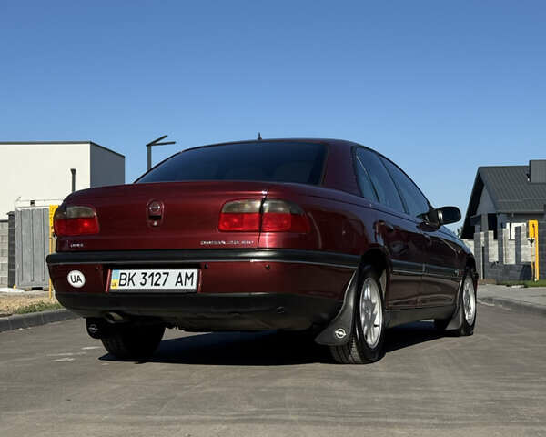 Красный Опель Омега, объемом двигателя 2 л и пробегом 298 тыс. км за 3500 $, фото 8 на Automoto.ua