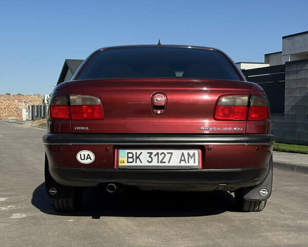Красный Опель Омега, объемом двигателя 2 л и пробегом 298 тыс. км за 3500 $, фото 9 на Automoto.ua
