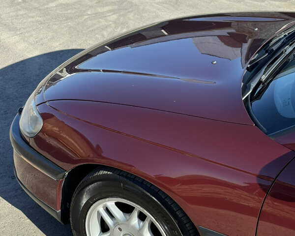 Красный Опель Омега, объемом двигателя 2 л и пробегом 298 тыс. км за 3500 $, фото 7 на Automoto.ua