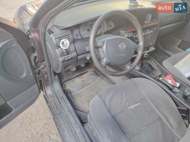 Червоний Опель Омега, об'ємом двигуна 2.2 л та пробігом 401 тис. км за 3500 $, фото 4 на Automoto.ua
