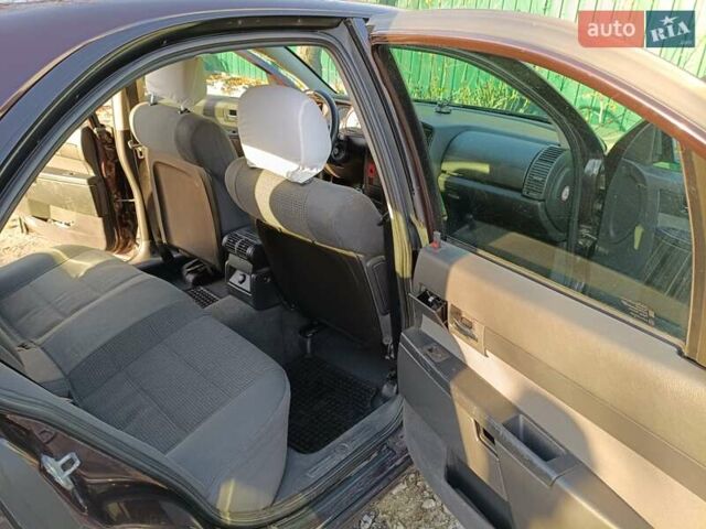 Красный Опель Омега, объемом двигателя 2.2 л и пробегом 222 тыс. км за 3500 $, фото 8 на Automoto.ua