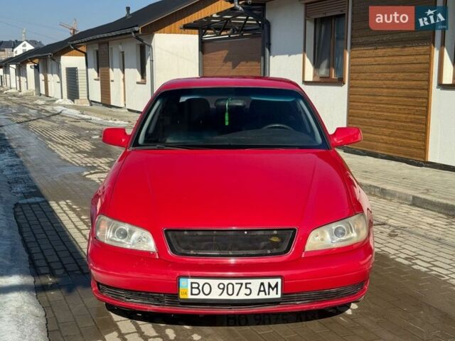 Красный Опель Омега, объемом двигателя 2.2 л и пробегом 300 тыс. км за 2300 $, фото 9 на Automoto.ua