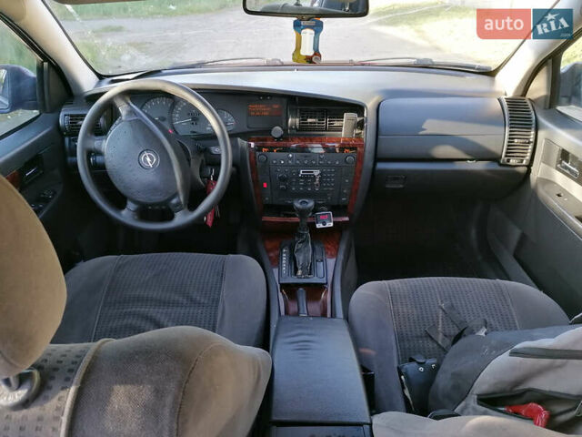 Красный Опель Омега, объемом двигателя 2.6 л и пробегом 336 тыс. км за 1800 $, фото 17 на Automoto.ua