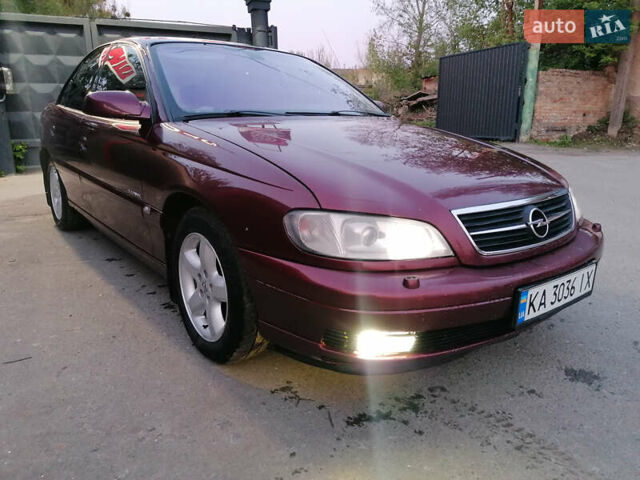 Красный Опель Омега, объемом двигателя 2.6 л и пробегом 336 тыс. км за 1800 $, фото 2 на Automoto.ua