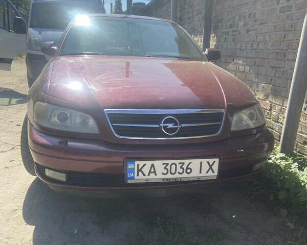 Червоний Опель Омега, об'ємом двигуна 2.6 л та пробігом 336 тис. км за 2000 $, фото 4 на Automoto.ua