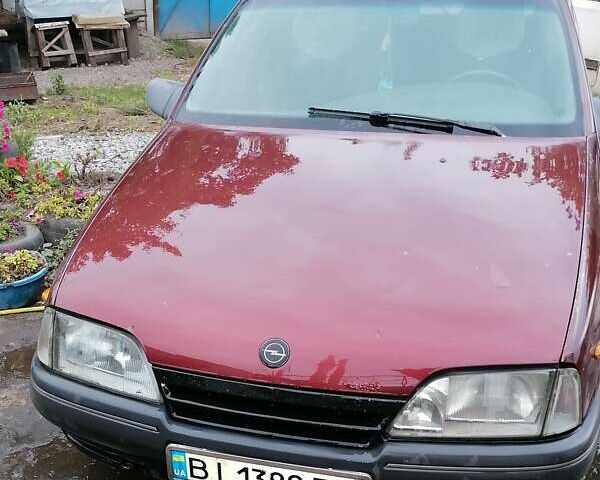 Красный Опель Омега, объемом двигателя 2.26 л и пробегом 150 тыс. км за 1400 $, фото 1 на Automoto.ua