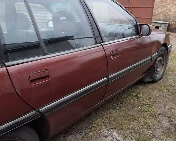 Красный Опель Омега, объемом двигателя 2 л и пробегом 300 тыс. км за 1200 $, фото 3 на Automoto.ua