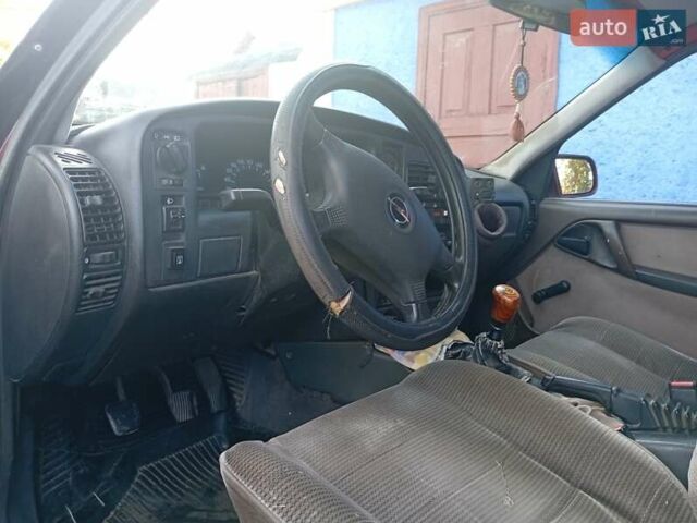 Красный Опель Омега, объемом двигателя 2 л и пробегом 400 тыс. км за 1300 $, фото 14 на Automoto.ua