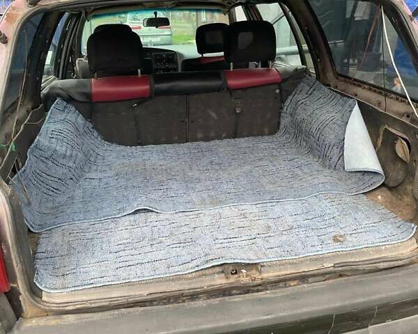 Червоний Опель Омега, об'ємом двигуна 2 л та пробігом 490 тис. км за 826 $, фото 4 на Automoto.ua