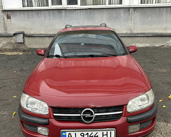 Червоний Опель Омега, об'ємом двигуна 2 л та пробігом 401 тис. км за 950 $, фото 1 на Automoto.ua