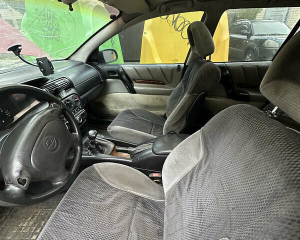 Червоний Опель Омега, об'ємом двигуна 2 л та пробігом 401 тис. км за 950 $, фото 6 на Automoto.ua