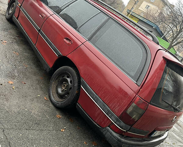 Червоний Опель Омега, об'ємом двигуна 2 л та пробігом 401 тис. км за 950 $, фото 3 на Automoto.ua
