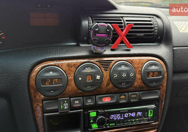 Червоний Опель Омега, об'ємом двигуна 2 л та пробігом 321 тис. км за 3000 $, фото 19 на Automoto.ua