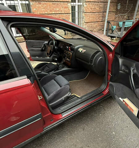 Червоний Опель Омега, об'ємом двигуна 2 л та пробігом 321 тис. км за 3000 $, фото 7 на Automoto.ua