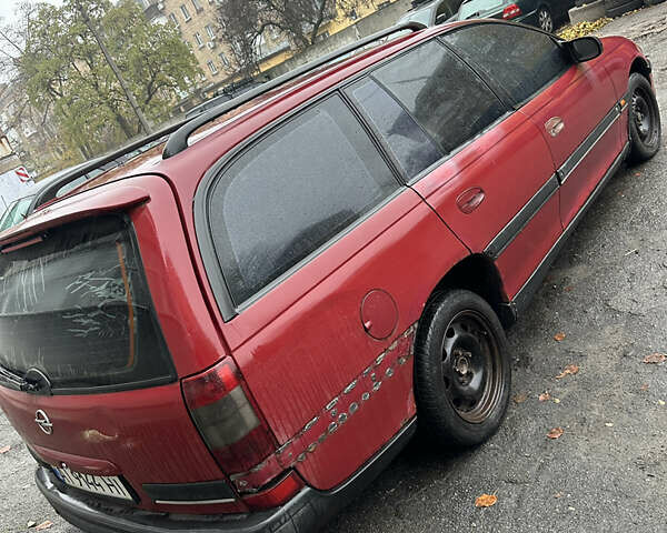 Червоний Опель Омега, об'ємом двигуна 2 л та пробігом 401 тис. км за 950 $, фото 4 на Automoto.ua