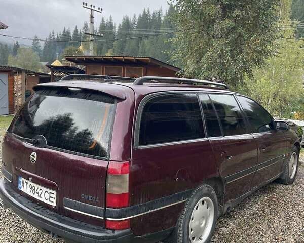 Красный Опель Омега, объемом двигателя 2 л и пробегом 250 тыс. км за 1200 $, фото 6 на Automoto.ua