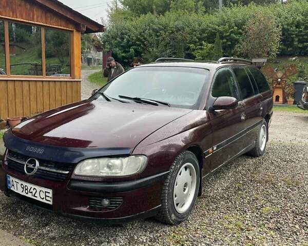 Красный Опель Омега, объемом двигателя 2 л и пробегом 250 тыс. км за 1200 $, фото 7 на Automoto.ua