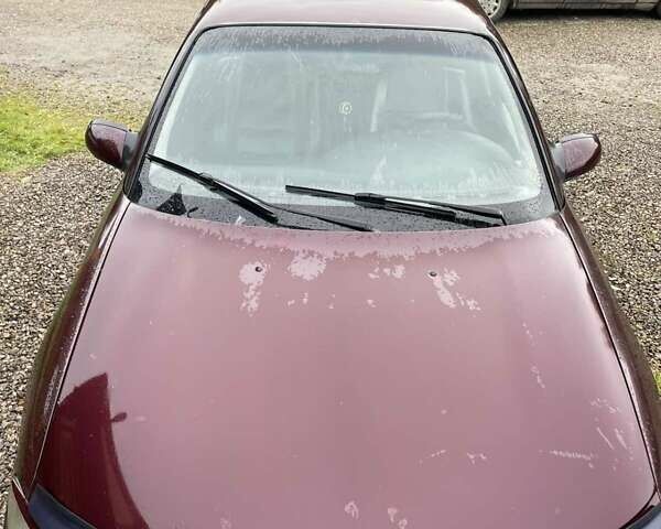 Красный Опель Омега, объемом двигателя 2 л и пробегом 250 тыс. км за 1100 $, фото 4 на Automoto.ua