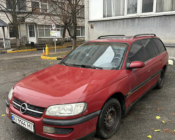 Червоний Опель Омега, об'ємом двигуна 2 л та пробігом 401 тис. км за 950 $, фото 2 на Automoto.ua