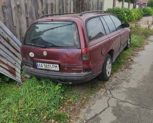 Красный Опель Омега, объемом двигателя 2 л и пробегом 300 тыс. км за 1800 $, фото 3 на Automoto.ua