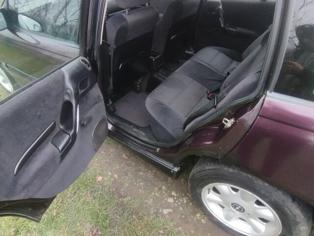 Красный Опель Омега, объемом двигателя 2 л и пробегом 199 тыс. км за 1350 $, фото 7 на Automoto.ua