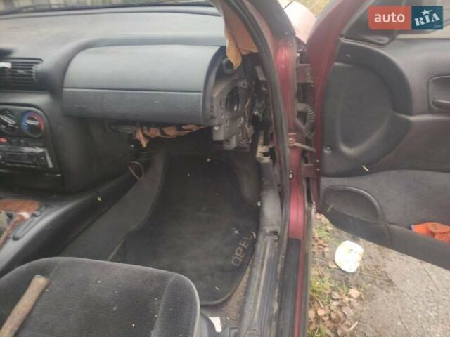 Красный Опель Омега, объемом двигателя 2 л и пробегом 300 тыс. км за 1800 $, фото 9 на Automoto.ua