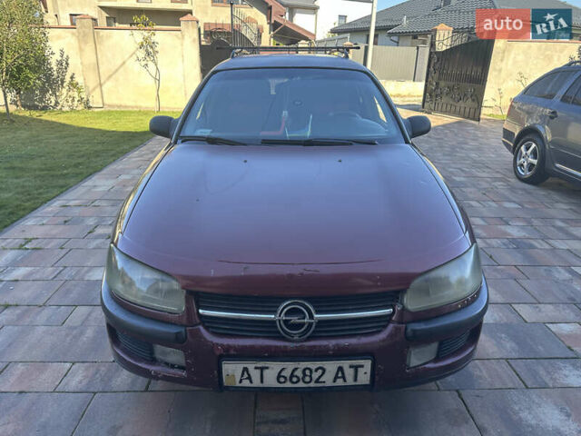 Красный Опель Омега, объемом двигателя 2 л и пробегом 310 тыс. км за 1200 $, фото 1 на Automoto.ua