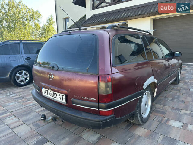 Красный Опель Омега, объемом двигателя 2 л и пробегом 310 тыс. км за 1200 $, фото 5 на Automoto.ua