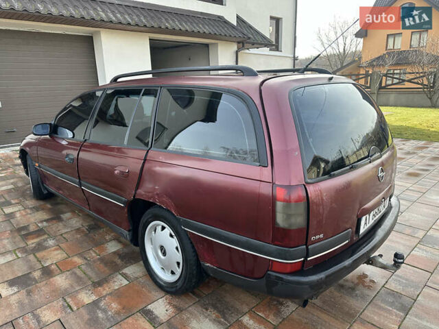 Красный Опель Омега, объемом двигателя 2 л и пробегом 310 тыс. км за 1200 $, фото 6 на Automoto.ua