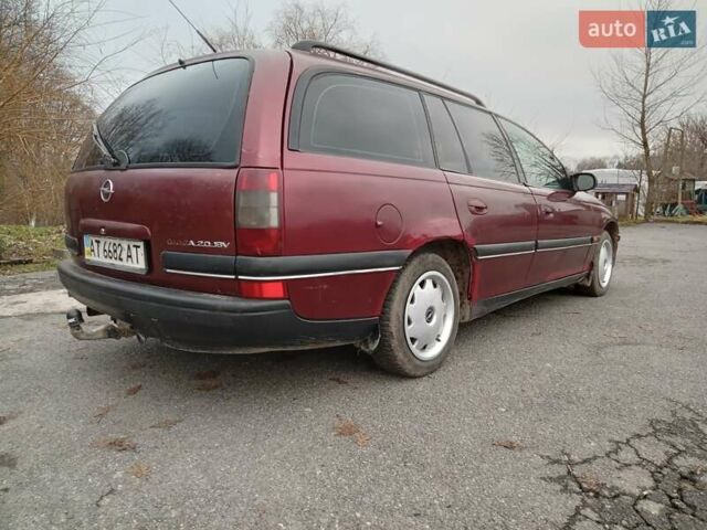 Красный Опель Омега, объемом двигателя 2 л и пробегом 317 тыс. км за 1450 $, фото 32 на Automoto.ua