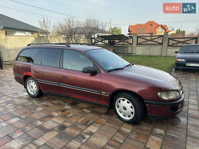 Красный Опель Омега, объемом двигателя 2 л и пробегом 310 тыс. км за 1200 $, фото 1 на Automoto.ua