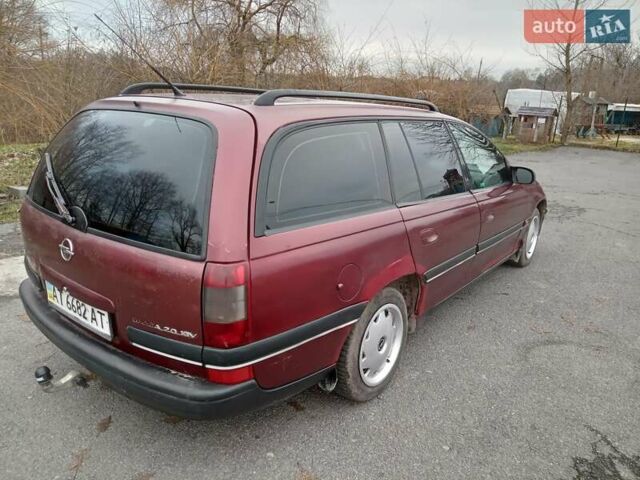 Красный Опель Омега, объемом двигателя 2 л и пробегом 317 тыс. км за 1450 $, фото 10 на Automoto.ua