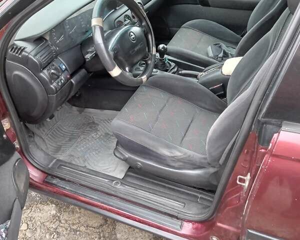 Красный Опель Омега, объемом двигателя 2 л и пробегом 317 тыс. км за 1450 $, фото 27 на Automoto.ua