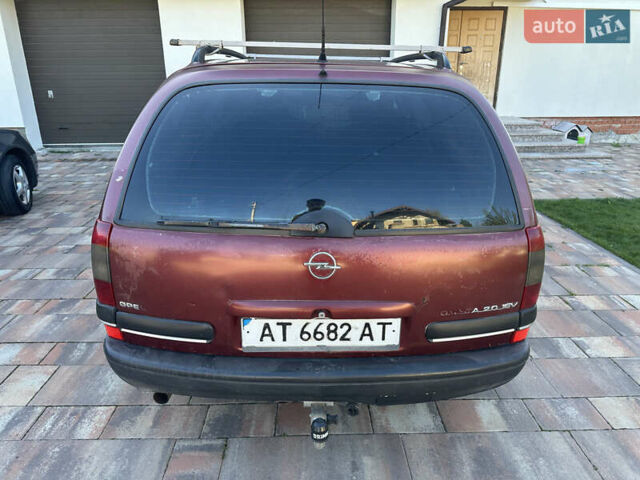 Красный Опель Омега, объемом двигателя 2 л и пробегом 310 тыс. км за 1200 $, фото 3 на Automoto.ua