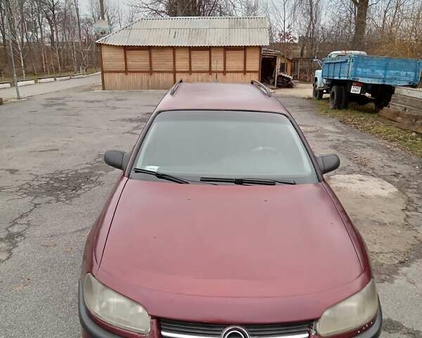 Красный Опель Омега, объемом двигателя 2 л и пробегом 317 тыс. км за 1450 $, фото 7 на Automoto.ua