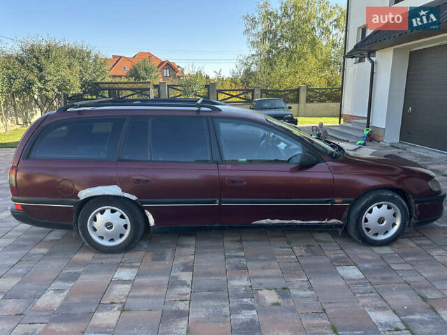 Красный Опель Омега, объемом двигателя 2 л и пробегом 310 тыс. км за 1200 $, фото 2 на Automoto.ua