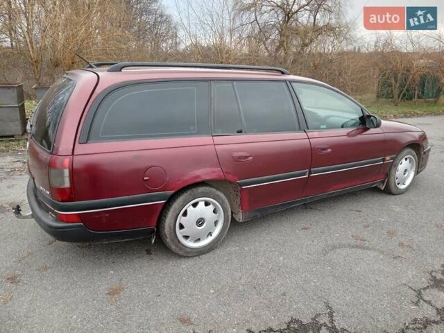 Красный Опель Омега, объемом двигателя 2 л и пробегом 317 тыс. км за 1450 $, фото 9 на Automoto.ua