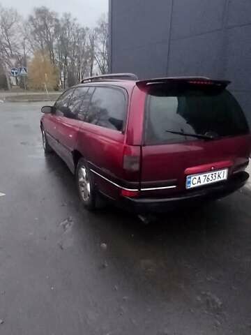 Червоний Опель Омега, об'ємом двигуна 2 л та пробігом 450 тис. км за 1500 $, фото 2 на Automoto.ua