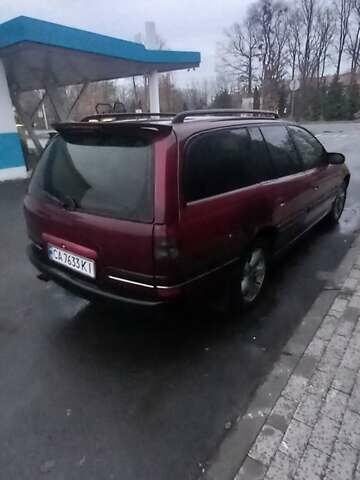 Червоний Опель Омега, об'ємом двигуна 2 л та пробігом 450 тис. км за 1500 $, фото 4 на Automoto.ua