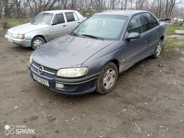 Серый Опель Омега, объемом двигателя 2 л и пробегом 100 тыс. км за 1800 $, фото 1 на Automoto.ua