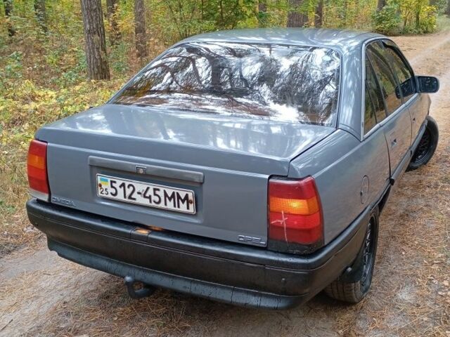 Сірий Опель Омега, об'ємом двигуна 2 л та пробігом 150 тис. км за 713 $, фото 6 на Automoto.ua