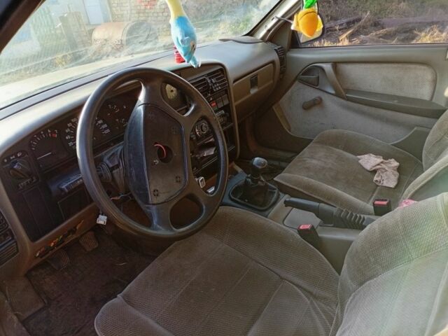 Сірий Опель Омега, об'ємом двигуна 2 л та пробігом 100 тис. км за 400 $, фото 2 на Automoto.ua