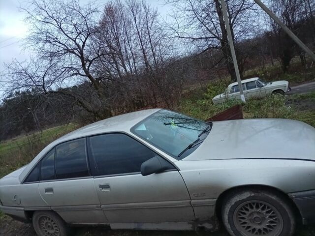 Сірий Опель Омега, об'ємом двигуна 2 л та пробігом 100 тис. км за 400 $, фото 7 на Automoto.ua