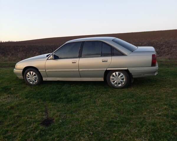 Серый Опель Омега, объемом двигателя 2 л и пробегом 244 тыс. км за 1800 $, фото 1 на Automoto.ua